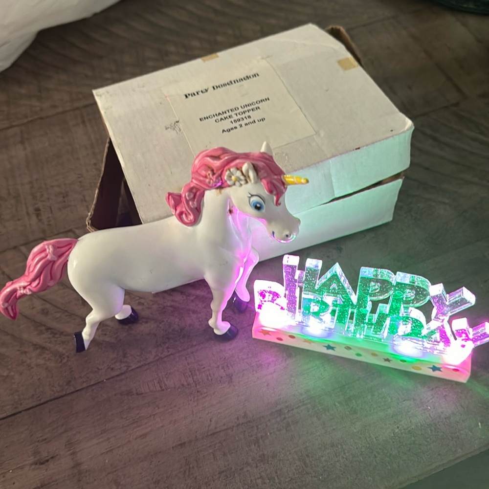 Unicorn enchanted cake topper with a flashing light happy birthday sign- used